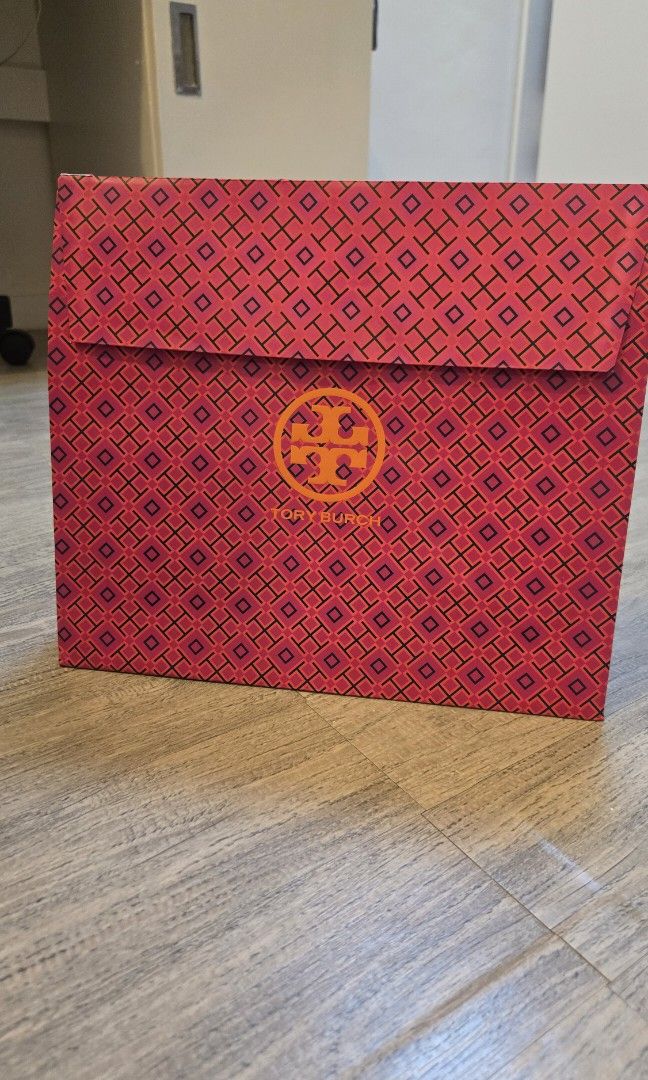 Tory Burch Brown Leather Tote Bag with Strap (Category: Luxury Bags & Wallets) located in Manila. Submitted by xiaauma (Listing ID 1449719733, Image 2). Description: - Genuine brown pebbled leather Tory Burch tote bag - Elegant gold hardware details - Comes with a detachable crossbody strap for versatile wear - Ample interior space for all your essentials - Ideal for everyday use or weekend trips.