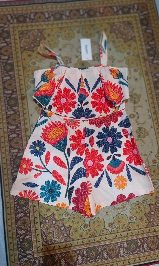 Tribal bobo syle jumpsuit (Category: Jumpsuits) located in Manila. Submitted by carolgaza14 (Listing ID 1450560110, Image 2). Description: Medium on tag Boho style elastic waisted Ruched Ruffle cold shoulder.