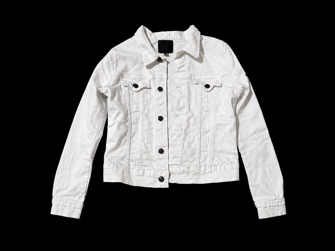 True Religion White Denim Jacket and Jeans Set (Category: Coats, Jackets and Outerwear) located in Manila. Submitted by yves2ks (Listing ID 1450729403, Image 2). Description: - White denim jacket and bootcut jeans set - Jacket features button closure and pockets - Jeans have a classic five-pocket design - Made from a comfortable cotton and elastane blend - Ideal for creating a stylish casual look.
