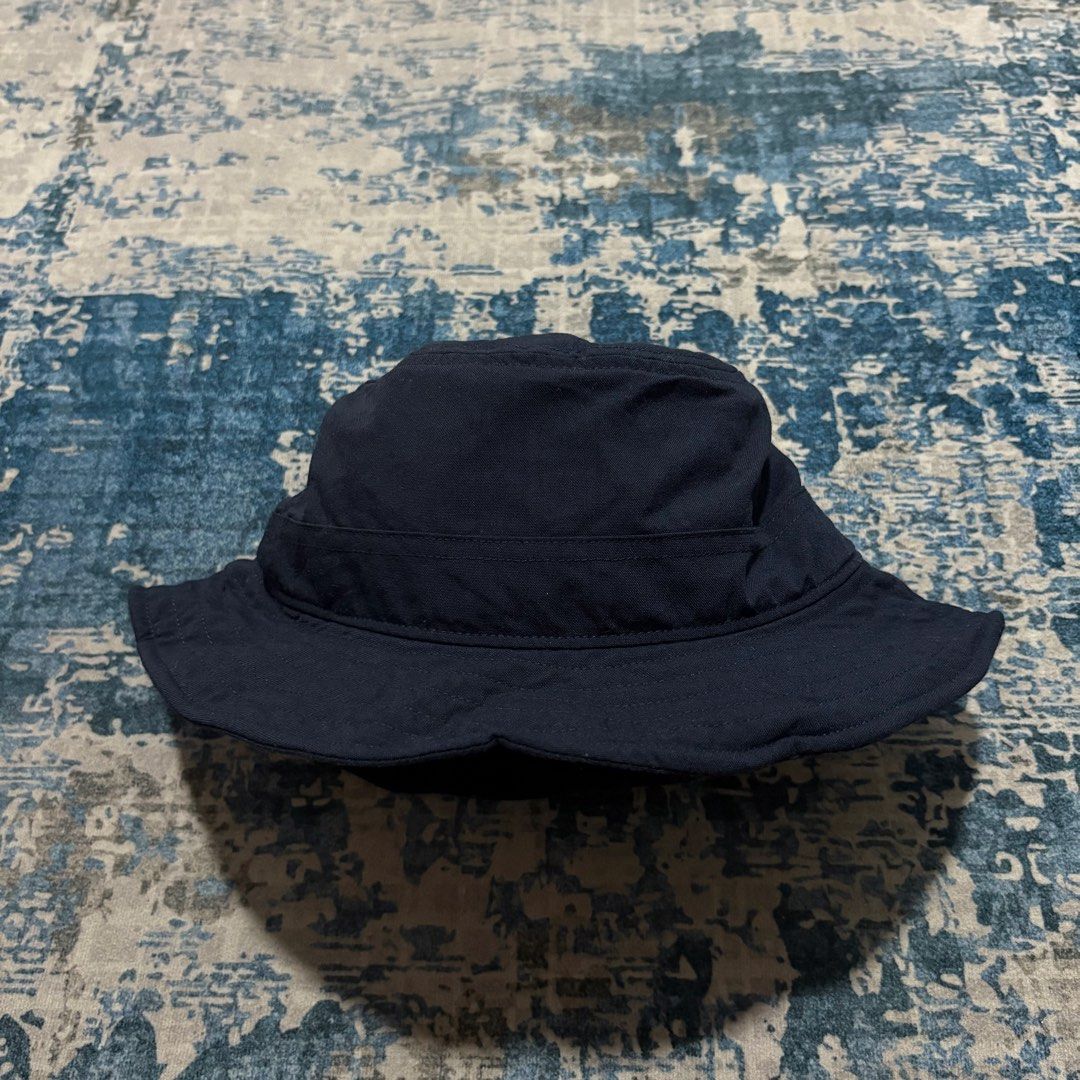 Uniqlo nylon bucket hat (Category: Cap & Hats) located in Sungai Petani. Submitted by triplethrift_ (Listing ID 1450716175, Image 1). Description: 9.5/10 size refer pic tag .