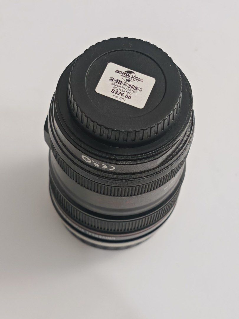 Universal Studios Canon EF 24-105mm Lens Mug (Category: Coffee & Tea Tableware) located in Quezon City. Submitted by krismocha (Listing ID 1450697366, Image 2). Description: - Novelty mug designed like a Canon EF 24-105mm f/4L IS USM lens - Features a durable stainless steel interior - Includes a convenient black lid - Ideal gift for photographers and camera enthusiasts - Unique and fun conversation starter - Original price tag from Universal Stu