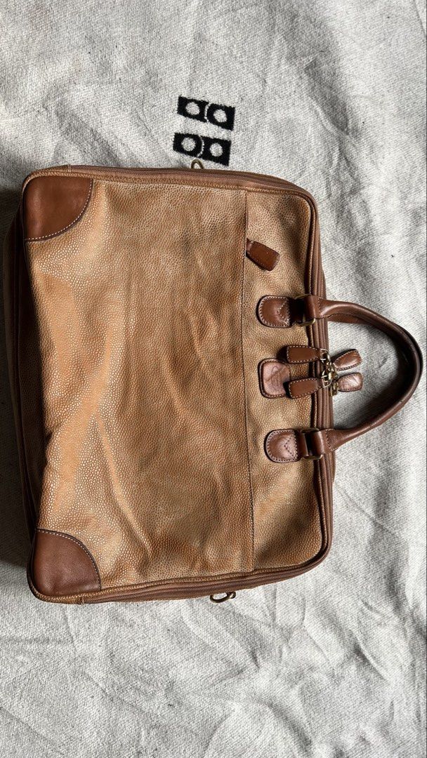 BRIC’S Brown Leather Briefcase Laptop Bag (Category: Briefcases) located in Cagayan de Oro. Submitted by nelsondel21723 (Listing ID 1450586173, Image 1). Description: - BRIC’S brown leather briefcase - Spacious interior for laptop and documents - dimension W 17.5 X 13 - Two main compartments - One internal zipped pocket - Sturdy handles - replacement sling strap - Brass hardware - Timeless piece for work or travel.