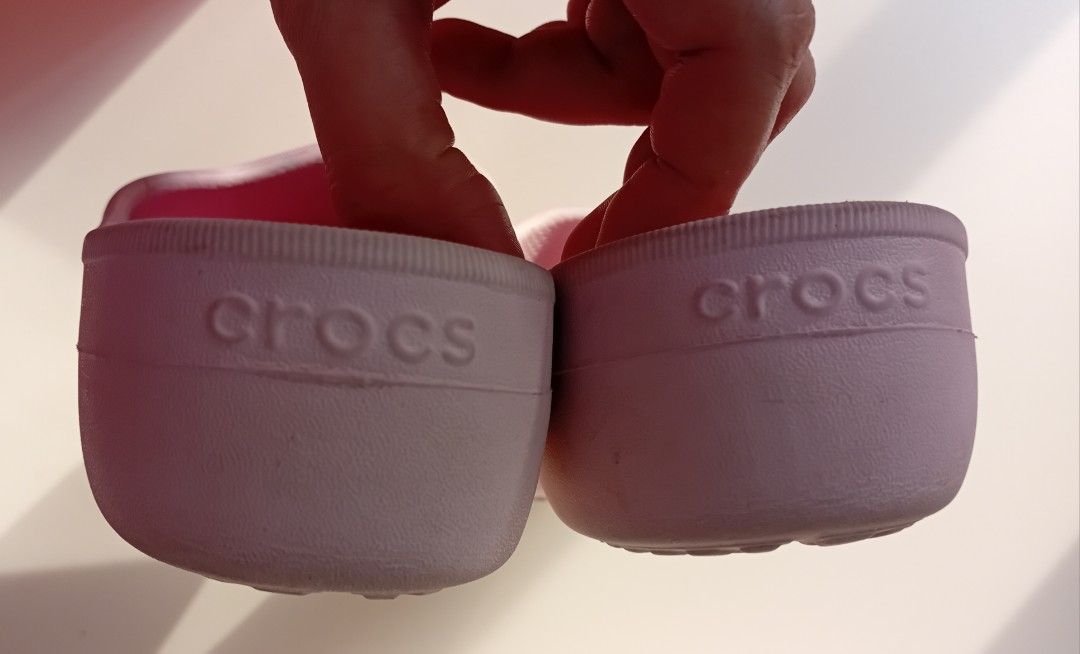 Vintage Crocs Pink Clogs with Charms (Category: Slippers and slides) located in Navotas City. Submitted by ms.soulana (Listing ID 1450655868, Image 3). Description: PreOwned lightly Used Authentic 💯🩷 Pink Crocs Womens clogs wth Jibbitz Womens 9 25 cm - Decorated with cute charms - Fun pink swirl pattern inside - Easy slip-on design - Soles with good grip - Ideal for casual wear or gardening Min Sign of Used No heel drag Good Condition 9/10.