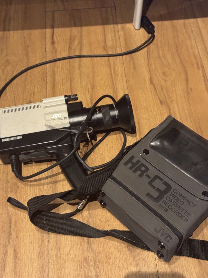 Vintage JVC VHS-C Camcorder Set (GX-N5E + HR-C3) — Retro Collector/Display Piece (Category: Video Cameras) located in Kuala Lumpur. Submitted by n1starfighter (Listing ID 1450652411, Image 2). Description: WTS Vintage JVC Video Camera & Recorder Set 📼✨ Barang lama, retro vibes , perfect for collectors, display, or props (photoshoot/film set). Set includes: • JVC GX-N5E Colour Video Camera (Newvicon tube) • JVC HR-C3 portable VHS-C recorder + sof
