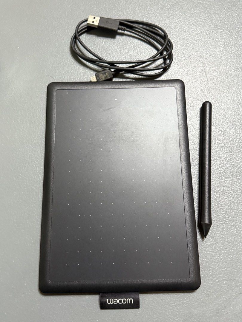 Wacom CTL 472 Graphics Drawing Tablet with Pen and USB Cable (Category: Other Accessories) located in Manila. Submitted by purchaeses (Listing ID 1450626582, Image 1). Description: - Wacom drawing tablet and stylus - CTL 472 model - Includes USB cable for connection - Ideal for digital art and design - Great for sketching, painting, and photo editing - Essential tool for your creative projects.