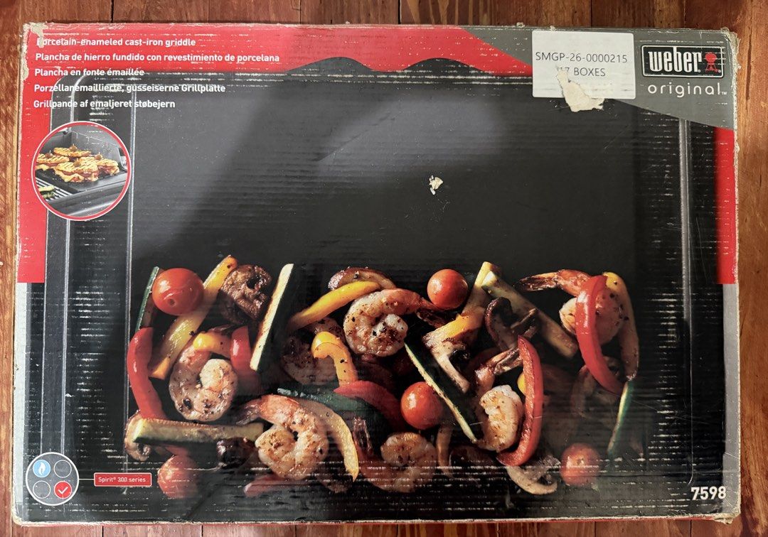 Weber Cast-Iron Griddle (Category: Cookware & Accessories) located in Manila. Submitted by ginaconde11 (Listing ID 1450538973, Image 2). Description: - Weber Griddle for Spirit 300 series grills - Made of durable porcelain-enameled cast-iron - Ideal for cooking breakfast, fish, vegetables, and sandwiches - Easy to clean.