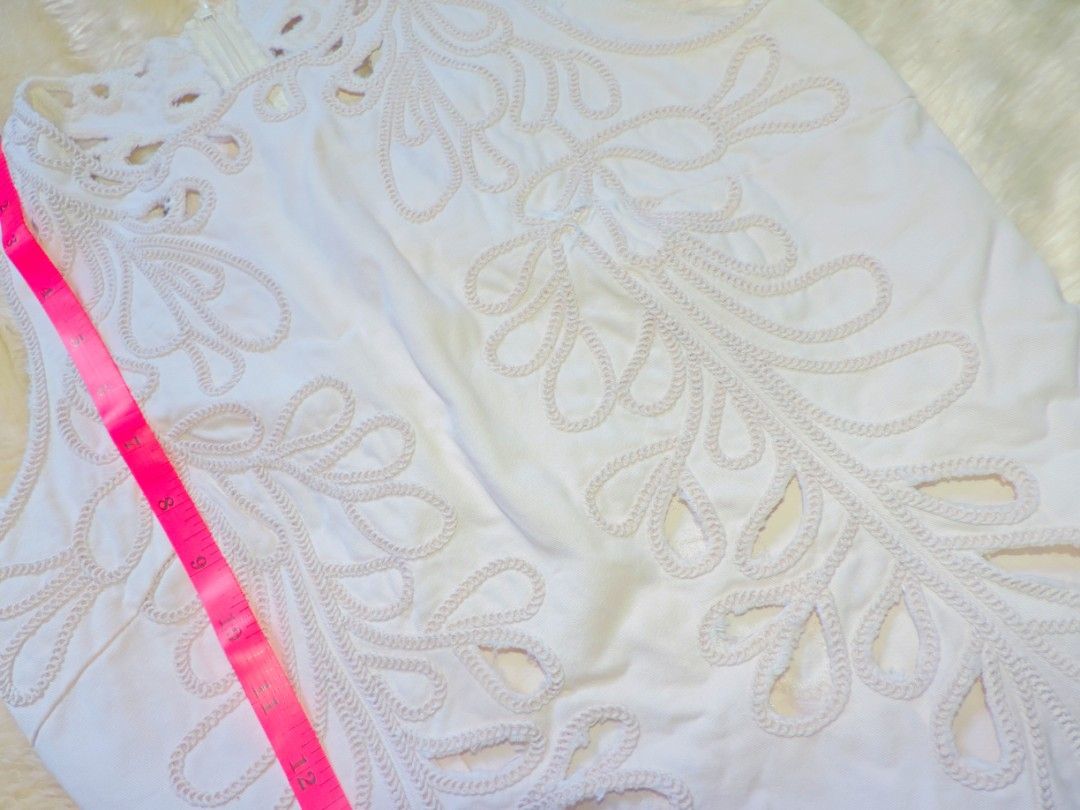 White Embroidered Sleeveless Mini Dress (Category: Dresses) located in Marikina City. Submitted by harmonicashoppe (Listing ID 1450597415, Image 3). Description: - 32 inches in length.