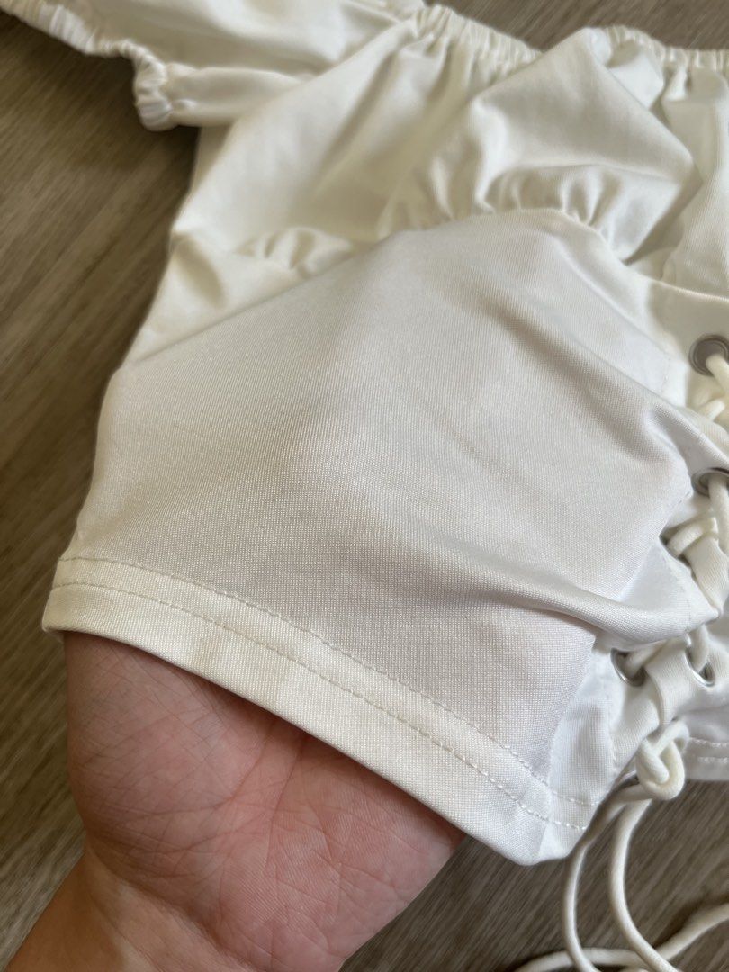 White Puff Sleeve Corset Crop Top (Category: Others Tops) located in Taytay. Submitted by j1123 (Listing ID 1450588586, Image 2). Description: - White puff sleeve crop top - Square neckline with lace-up front detail - Elasticated sleeves and neckline for a comfy fit - Stretchy and nice material - Versatile: great for nights out or casual days -.