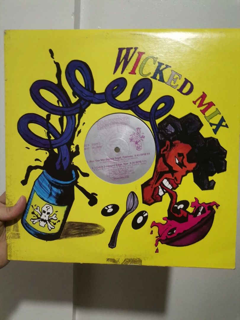 Wicked Mix Vinyl Record (Category: Vinyls) located in Makati City. Submitted by kookybearsstuff (Listing ID 1450667265, Image 1). Description: - Wicked Mix vinyl record - Features a vibrant yellow cover with unique artwork - Record label displays song titles - Ideal for vinyl collectors - Sold as is.