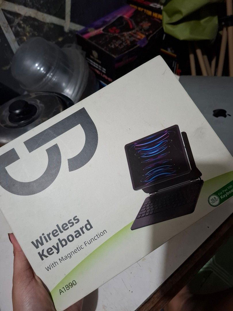 Wireless Keyboard with Magnetic Function (Category: Computer Keyboard) located in Manila. Submitted by a.yappy (Listing ID 1450666799, Image 3). Description: -Godjoodoq - White wireless keyboard - Magnetic function, doubles as a tablet stand - Integrated trackpad - Comes with original packaging - Ideal for portable typing - Simple and easy connection - use twice only, stains dahil sa tambak pero can clean. .