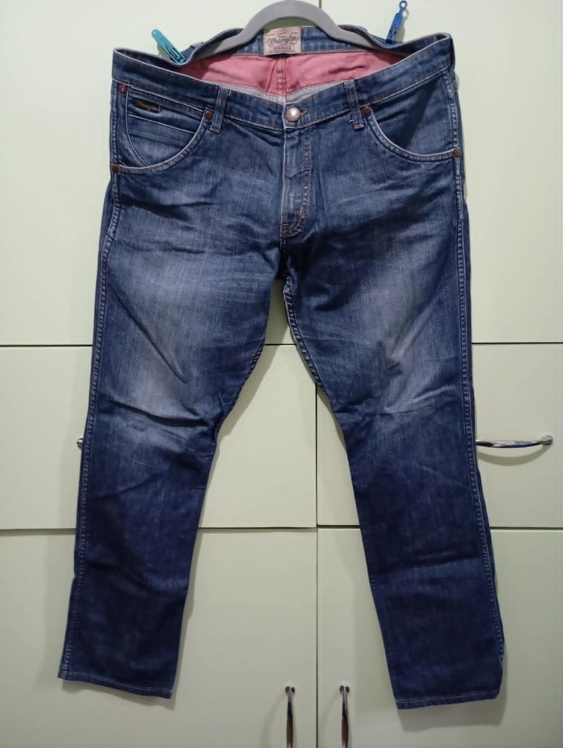 Wrangler Spencer Blue Denim Jeans (Category: Jeans) located in Pasig City. Submitted by ajms63804 (Listing ID 1450553217, Image 1). Description: - Classic blue denim jeans - Brand: Wrangler - Model: Spencer - Waist: 35-36 inches - Closure: Button fly - Pockets: Standard five-pocket design - Fit: Comfortable - Style: Great for casual wear - Condition: Good, no major flaws.