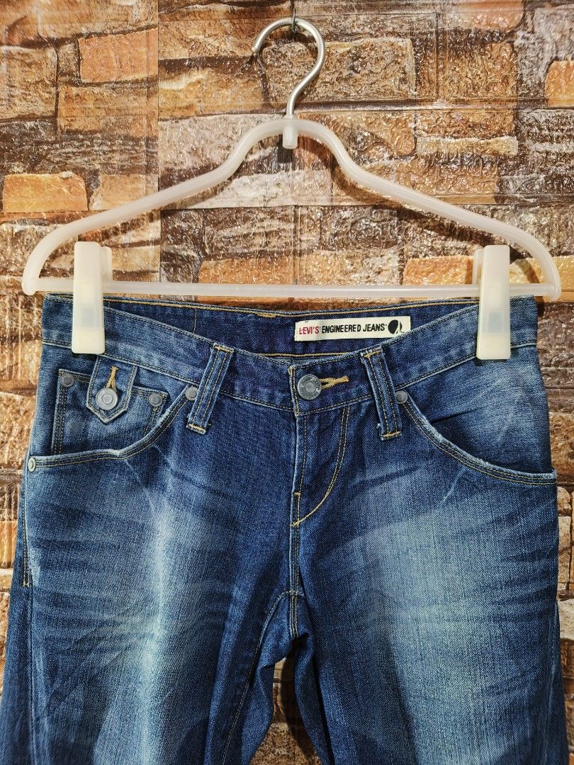 Y2k Levi's Engineered Jeans low rise flared jeans (Category: Jeans) located in Davao. Submitted by vndrgd (Listing ID 1450718365, Image 2). Description: - Levi's Engineered Jeans for women - Size: 26 (fits waist 28-29) - Color: Classic blue wash - Style: Bootcut - Length: 40.5 inches - Hem: 9 inches - Perfect for everyday wear - Please check photos for detailed condition.