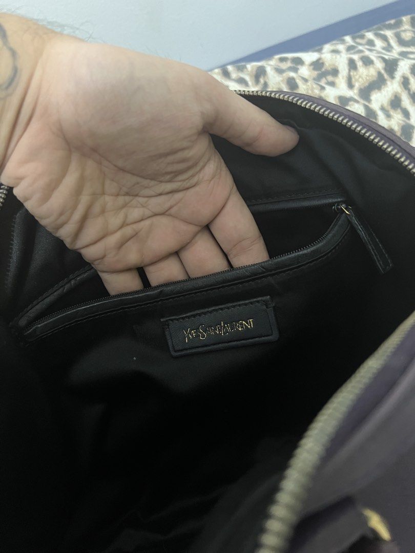 Yves Saint Laurent (YSL) Muse Bag (Category: Luxury Bags & Wallets) located in Quezon City. Submitted by inigodiago (Listing ID 1450585547, Image 3). Description: - Authentic Yves Saint Laurent Muse Two handbag - Deep purple leather with gold hardware - Zipper closure - Interior zippered and slip pockets - Versatile for everyday or special occasions - Shows some signs of wear, but plenty of life left.