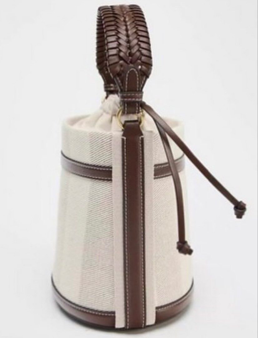 Zara Bucket Bag (Category: Cross-body Bags) located in Mexico. Submitted by 3everything (Listing ID 1450721821, Image 2). Description: - Unique braided top handle - Detachable crossbody strap included - Secure drawstring closure - Perfect size for everyday essentials - Great for casual day outs Available 3 colors. See pics 850 each Location Pampanga.