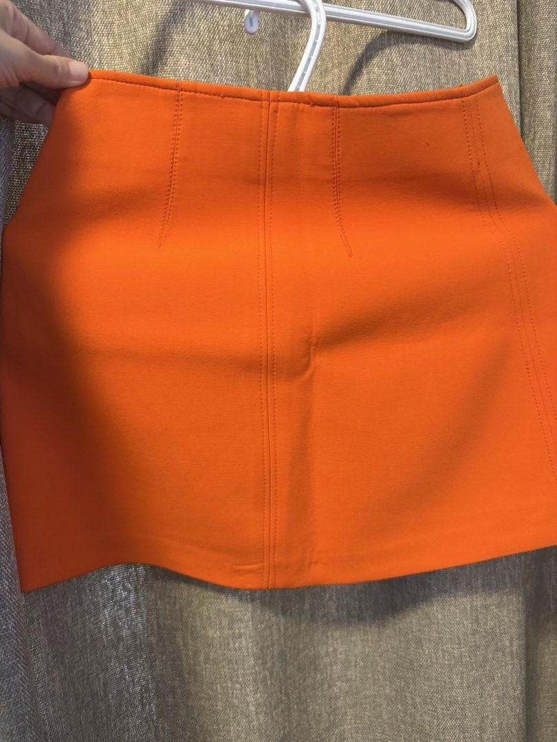 ZARA Orange A-Line Mini Skirt Size S (Category: Skirts) located in Quezon City. Submitted by andreaeliz (Listing ID 1450556628, Image 2). Description: - Zara orange mini skirt - A-line cut - Made in Morocco - Perfect for dressing up or down - Simple and chic design.