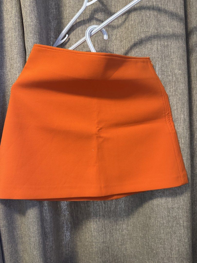 ZARA Orange A-Line Mini Skirt Size S (Category: Skirts) located in Quezon City. Submitted by andreaeliz (Listing ID 1450556628, Image 1). Description: - Zara orange mini skirt - A-line cut - Made in Morocco - Perfect for dressing up or down - Simple and chic design.