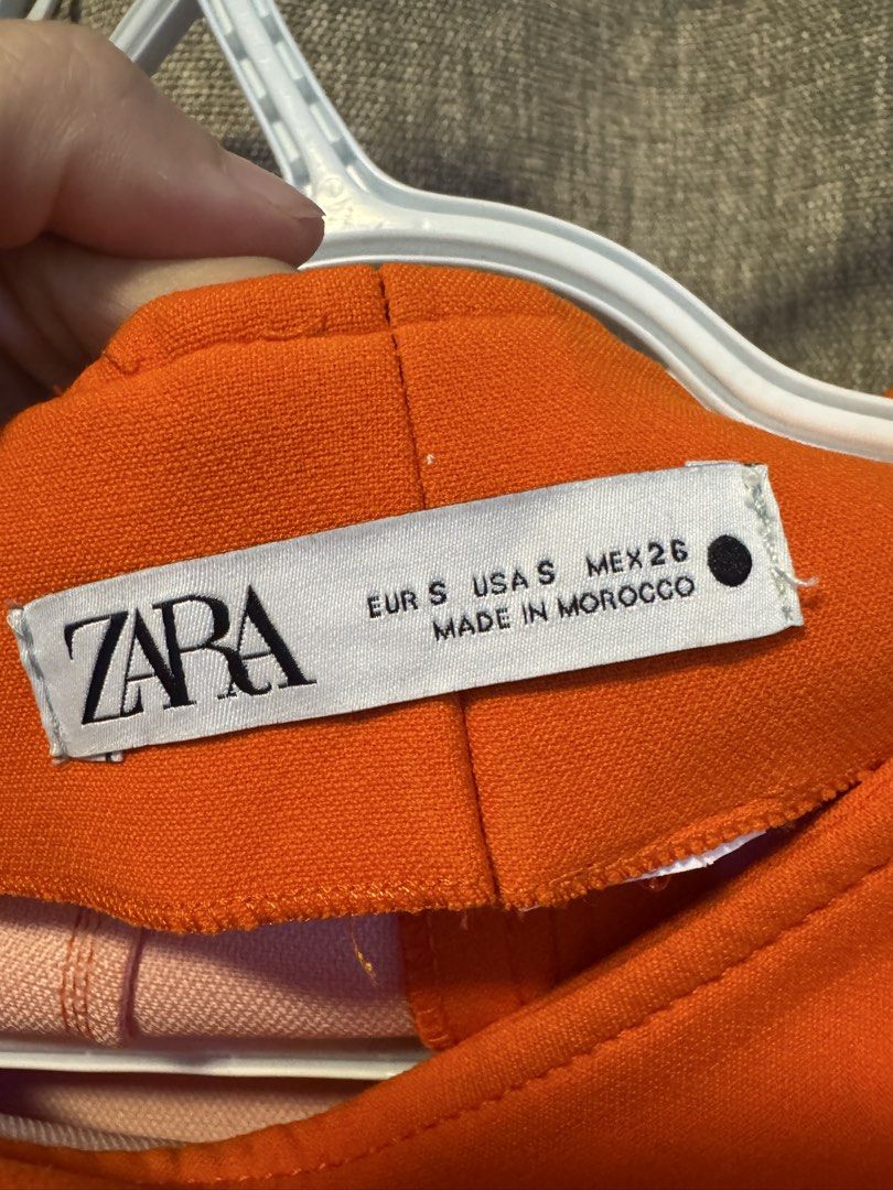 ZARA Orange A-Line Mini Skirt Size S (Category: Skirts) located in Quezon City. Submitted by andreaeliz (Listing ID 1450556628, Image 3). Description: - Zara orange mini skirt - A-line cut - Made in Morocco - Perfect for dressing up or down - Simple and chic design.