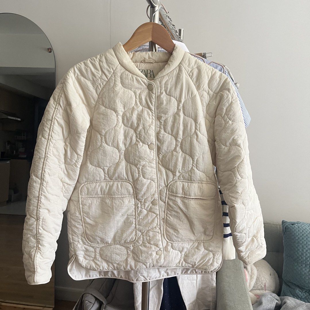 Zara Quilted Bomber Jacket Cream (Category: Coats, Jackets and Outerwear) located in Manila. Submitted by maechann (Listing ID 1450558138, Image 2). Description: - Zara cream quilted jacket - Round neckline with snap button closure - Two front pockets - Lightweight and coming - Ideal for layering - Easy to style for casual outfits model measurements: size small 5’2 50kg 26 waist.