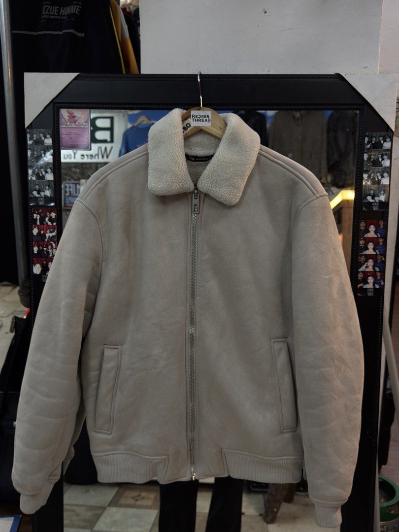 ZARA Sherpa Bomber Jacket (Category: Coats, Jackets and Outerwear) located in Baguio. Submitted by baguioguy (Listing ID 1450665180, Image 1). Description: Zara Bomber Sherpa Jacket Size: Shoulder: 21” Pit to pit:25” Length:26”.