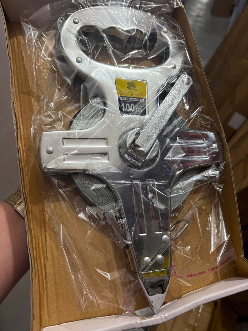 100m Measuring Tape with Metal Casing (Category: Construction Tools & Equipment) located in Caloocan City. Submitted by gelkhar071 (Listing ID 1447137689, Image 1). Description: - Heavy duty 100 meter measuring tape - Durable metal casing - Easy retraction with crank handle - Ideal for construction, surveying, and long-distance measuring - Brand new, still in original packaging.