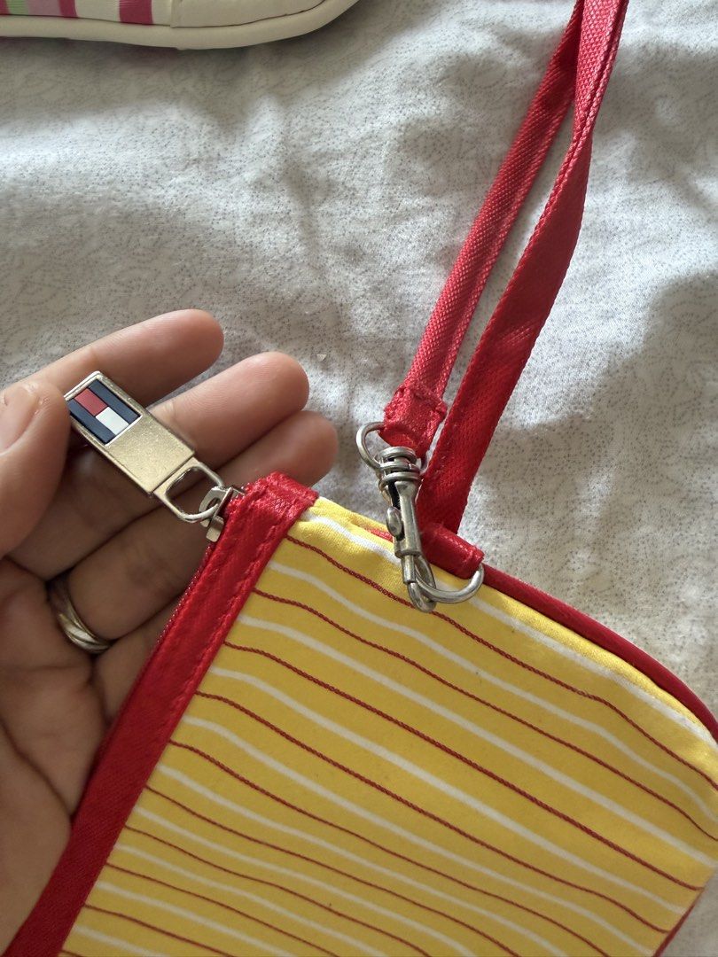 3x Cosmetic Pouches for take only (Category: Purses & Pouches) located in Manila. Submitted by kaiiishop (Listing ID 1447127630, Image 2). Description: White long pouch - Clinique Yellow stripe pouch - Tommy Hilfiger Pink white stripe pouch -Estee Lauder ‼️ FOR TAKE ALL ONLY .