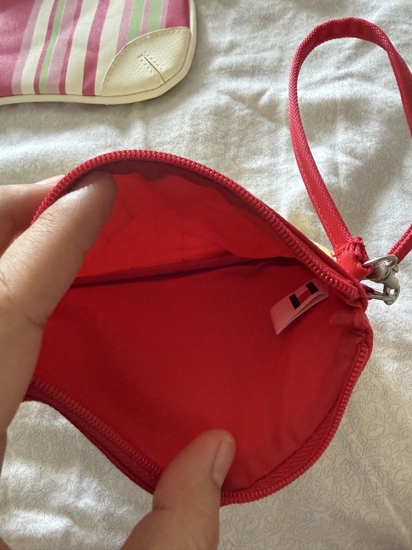 3x Cosmetic Pouches for take only (Category: Purses & Pouches) located in Manila. Submitted by kaiiishop (Listing ID 1447127630, Image 3). Description: White long pouch - Clinique Yellow stripe pouch - Tommy Hilfiger Pink white stripe pouch -Estee Lauder ‼️ FOR TAKE ALL ONLY .