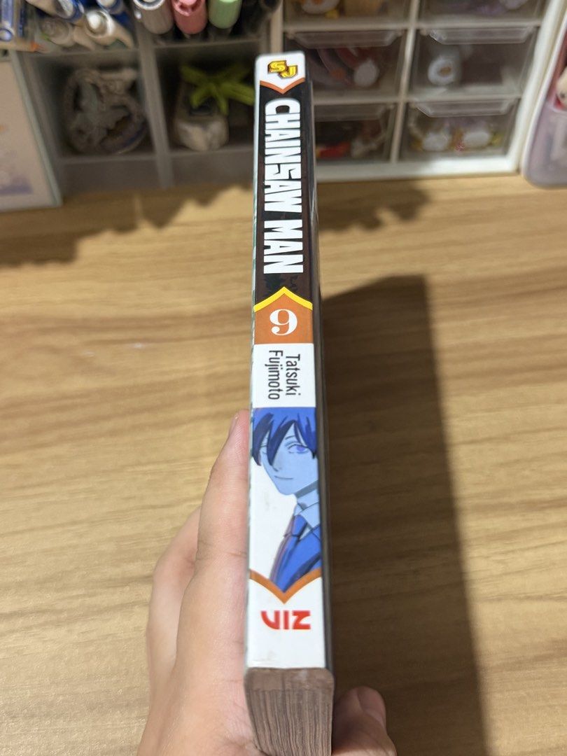⭐️ Mangas: Chainsaw Man #9 (Category: Comics & Manga) located in Taguig. Submitted by rayechord (Listing ID 1447248815, Image 3). Description: yes, i use the sylvanian cat for size reference 😊💐 🦭 title, language and type of manga: - Chainsaw Man #9 in ENGLISH from Shonen Jump - Bought from fully booked in 2022 - has evident foxing (check last 2 pictures). Rest assured i will do my best to disinfect and clean before shipping/meetup 😊⭐️.