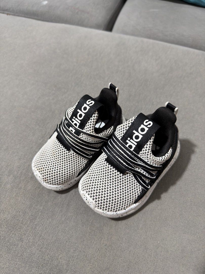 Adidas Kids Lite Racer Adapt (Category: Babies & Kids Fashion) located in Mandaluyong City. Submitted by raeshops (Listing ID 1447235931, Image 2). Description: - Adidas Kids Lite Racer Adapt 7.0 shoes - Black and white mesh with speckled midsole - Easy slip-on style with elastic straps - See photos for size Like new (worn twice only) No more box .
