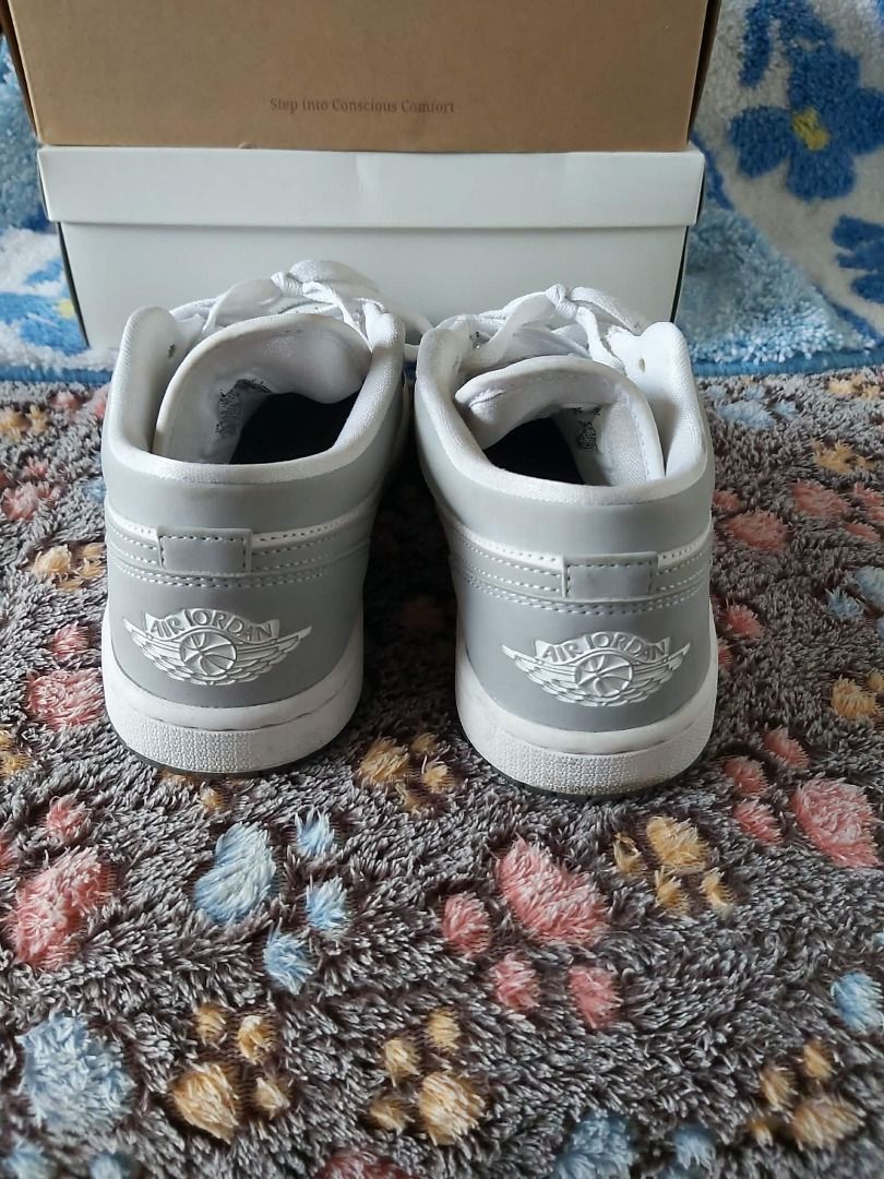 Air Jordan 1 Mid SE Grey White (Category: Sneakers) located in San Leonardo. Submitted by burgossanleonardo.12345 (Listing ID 1447110726, Image 2). Description: - Authentic Air Jordan 1 Mid SE - Colorway: Grey and White - Size: 6.5 US Men's - Condition: Clean, pre-owned - no Original box.