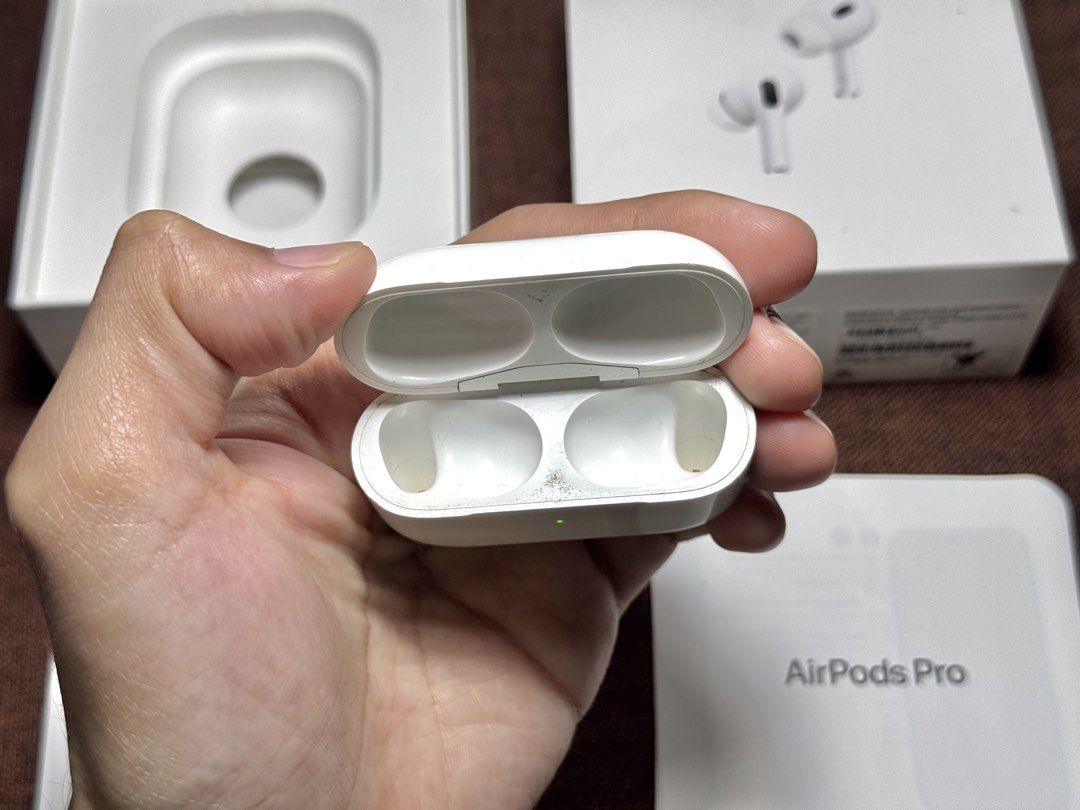 Airpods Pro 2 CHARGING CASE LIGHTNING (Category: Earphones) located in Manila. Submitted by prelovedbyporttt (Listing ID 1447149304, Image 2). Description: Airpods Pro 2 CHARGING CASE LIGHTNING Only issue: It has scratches but still perfectly working • 100% No hidden defects • 100% Battery health is in great condition • 100% Fully functional • 100% Original item (feel free to check my transaction post on my page for proof of authenticity) If you 