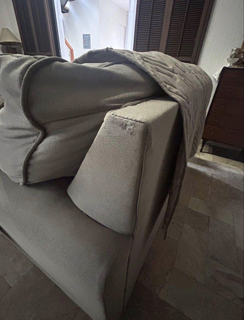 Ashley 2-Seater Sofa - Light Grey (Category: Sofas) located in Paranaque City. Submitted by buttonbabies (Listing ID 1447168156, Image 3). Description: - Comfortable 2-seater sofa - Light grey fabric - Dimensions: 160cm (L) x 95cm (W) x 82cm (H) - Minor wear on armrest, as pictured - Ideal for smaller living spaces - Plenty of life left!.