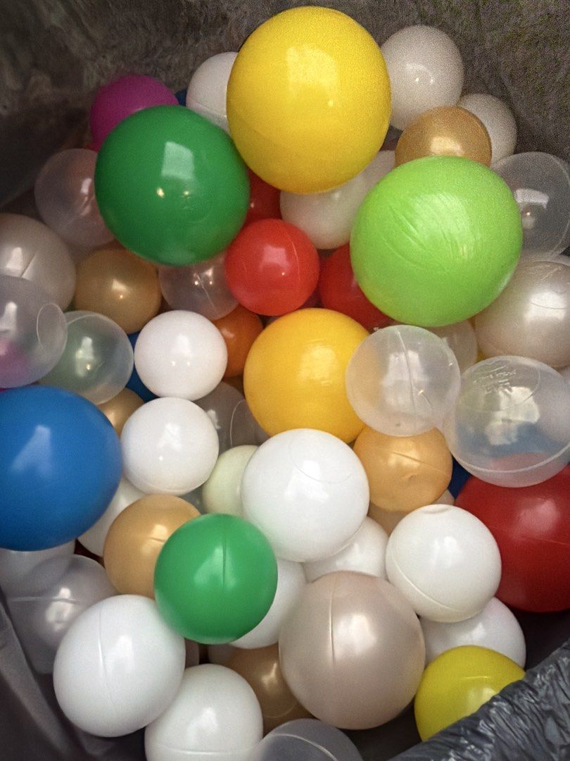 Assorted Plastic Balls for Ball Pit or Crafts (Category: Kids Toys) located in Singapore. Submitted by fashionforjoy (Listing ID 1447158366, Image 1). Description: - Assorted plastic balls - Various colors: green, yellow, red, blue, white (some clear) - Different sizes - Perfect for ball pits, sensory play, and DIY crafts - Plenty available.