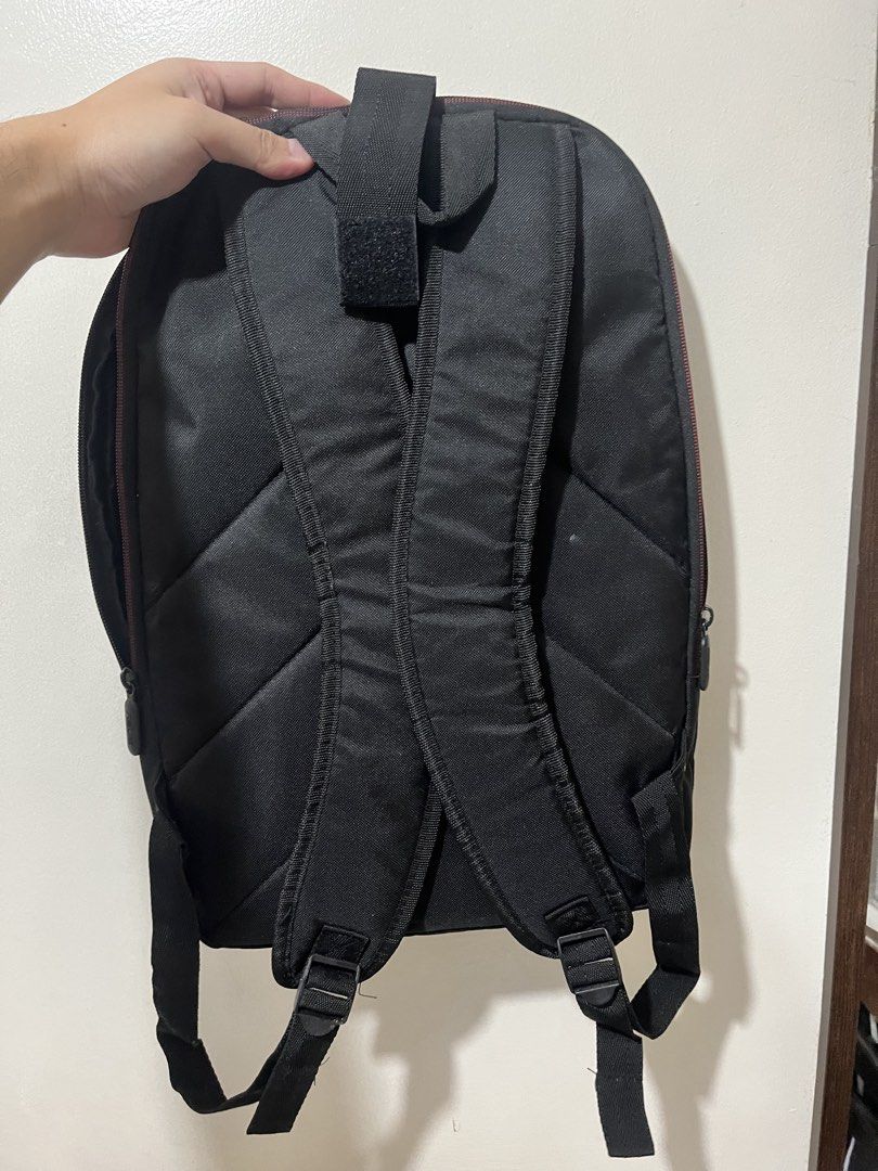 ASUS Black Backpack (Category: Backpacks) located in Quezon City. Submitted by vans_online_store (Listing ID 1447120149, Image 2). Description: - Sleek black ASUS backpack - Eye-catching red accent line on front pocket - Padded straps for maximum comfort - Multiple compartments for organized storage - Ideal for laptops and daily essentials - Clean and simple, versatile design.