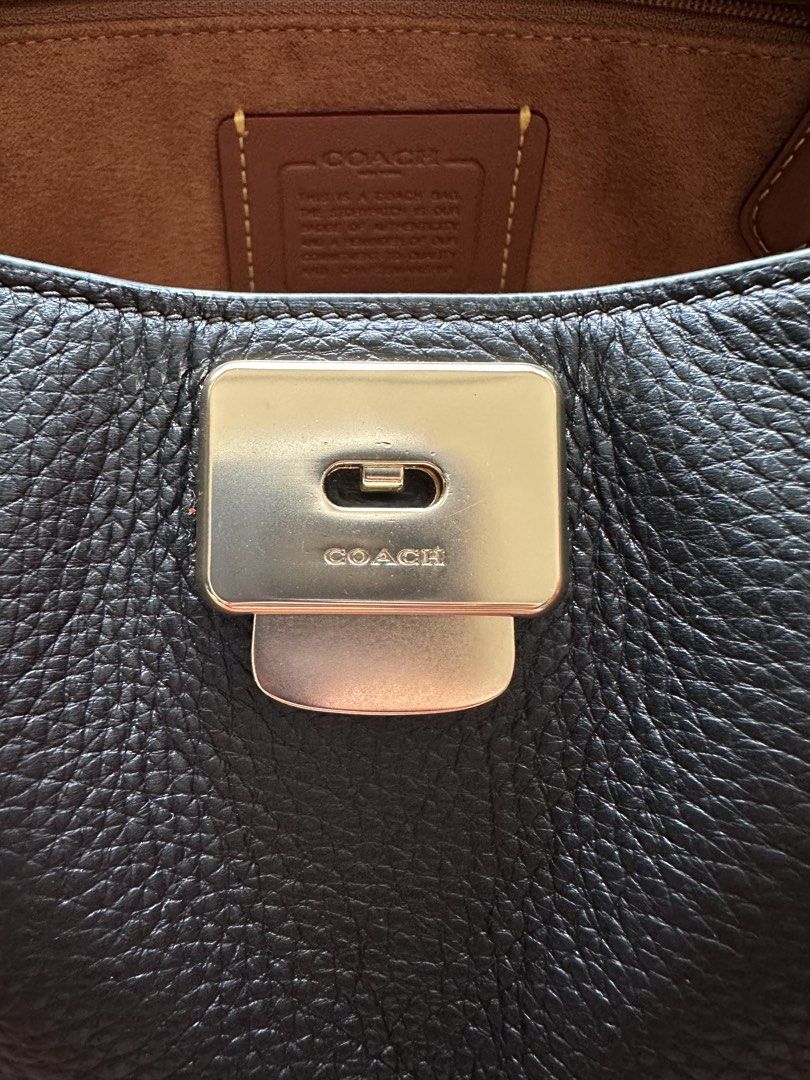 Authentic Coach Bridget flap bag (Category: Bags & Wallets) located in Kuala Lumpur. Submitted by beberm_ling (Listing ID 1447133814, Image 3). Description: Authentic coach bridget bought from usaloveshoppe, can attach purchase receipt through dm Only used for one month ^^ all still looking like new, bag is stor in acrylic box - Brand: Coach - Material: Black pebbled leather - Hardware: Gold-tone - Interior: 1 zip pocket, 1 main compartment - Inc