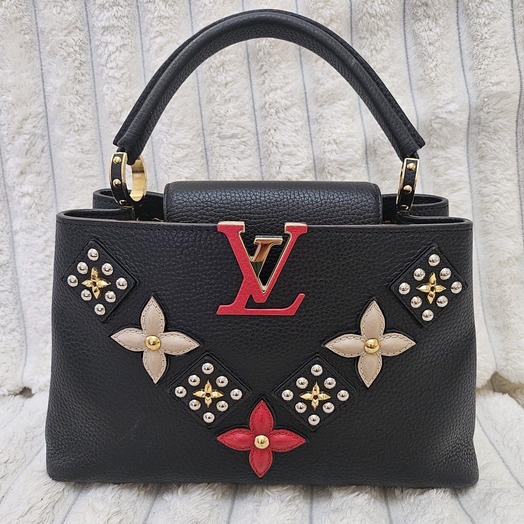 Authentic Louis Vuitton Limited Edition Capucines PM Size Bag (Category: Luxury Bags & Wallets) located in Rizal. Submitted by SummerPeaCloset (Listing ID 1447184140, Image 2). Description: Selling this stunning Authentic Louis Vuitton Capucine Limited Edition PM Size Handbag in excellent condition. It’s made of genuine leather, showcasing intricate floral embellishments that add a touch of elegance. The bag features a comfortable handle and come