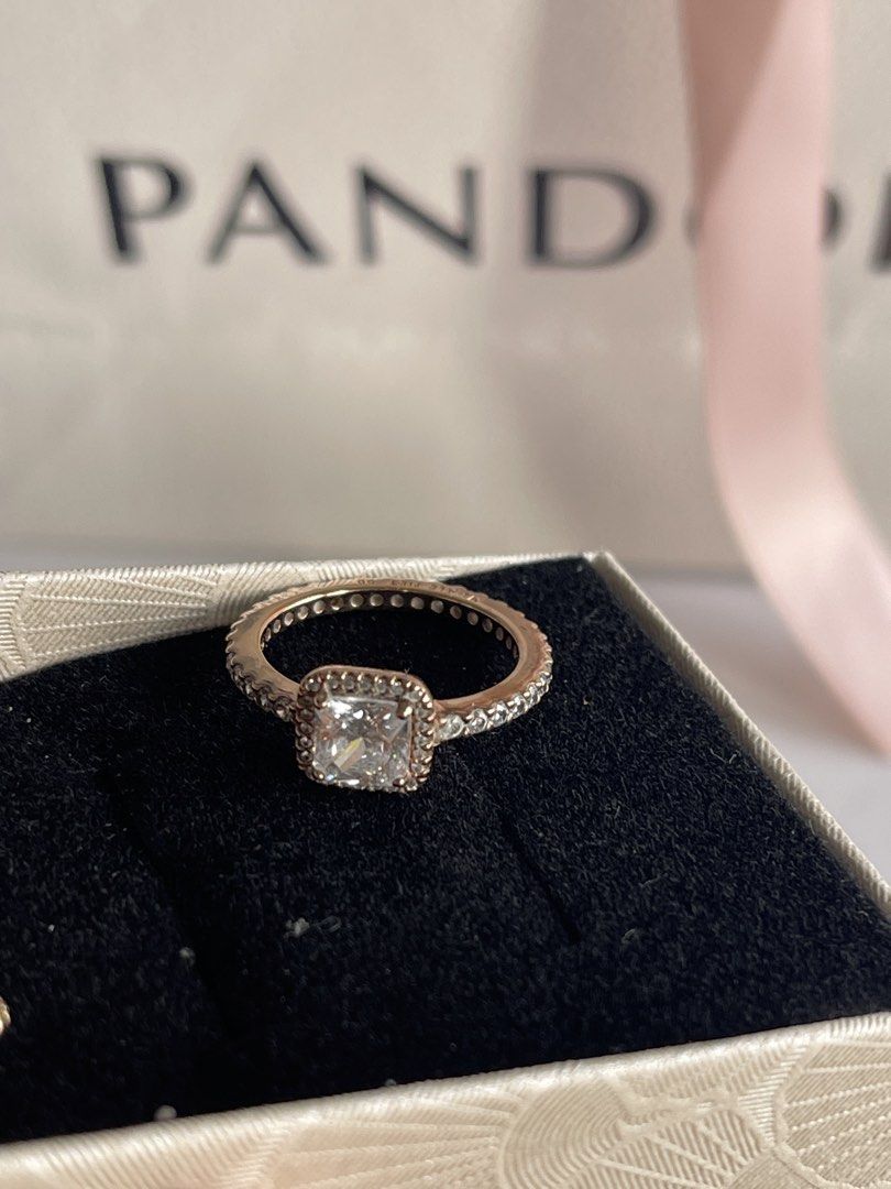 Authentic Pandora Rose Gold Square Halo Ring & Earrings Set (Category: Rings) located in Taguig. Submitted by supplementary (Listing ID 1447109639, Image 3). Description: - Pandora Rose Gold Ring and Matching Earrings Set - 100 % authentic - I lost the original box. - Ring is size 50 or 5 - I am selling set .