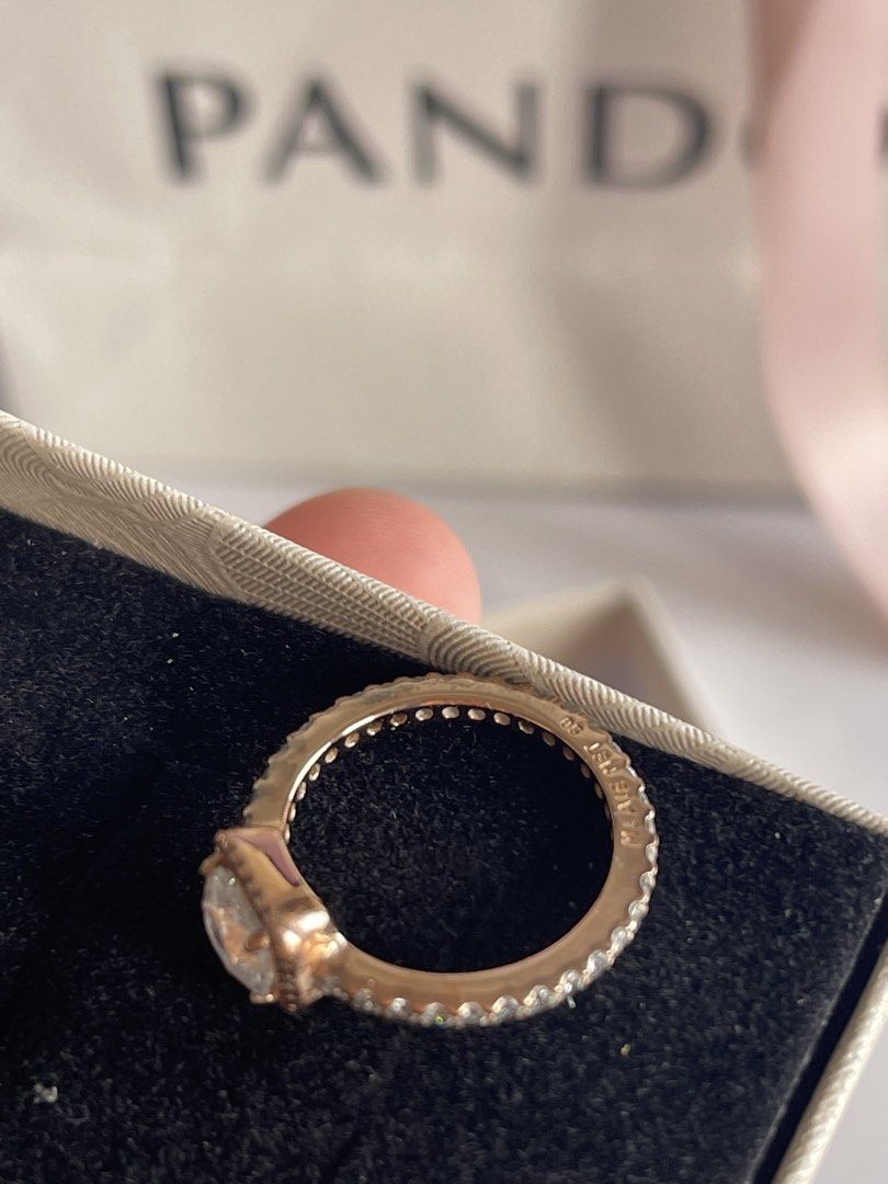 Authentic Pandora Rose Gold Square Halo Ring & Earrings Set (Category: Rings) located in Taguig. Submitted by supplementary (Listing ID 1447109639, Image 2). Description: - Pandora Rose Gold Ring and Matching Earrings Set - 100 % authentic - I lost the original box. - Ring is size 50 or 5 - I am selling set .