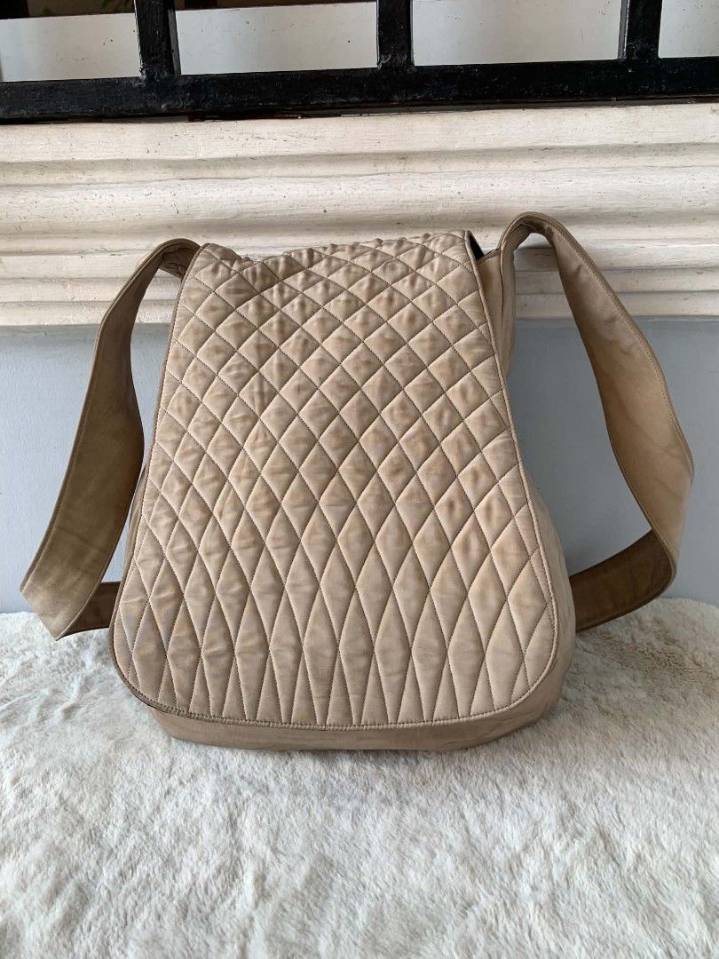 Bally Quilted Shoulder Bag Tan Suede (Category: Luxury Bags & Wallets) located in Taguig. Submitted by madisam (Listing ID 1447203983, Image 2). Description: - Tan Bally shoulder bag - Stylish quilted design - Adjustable strap for comfort - Interior features Bally logo lining - Secure zipper closure - Ample space for your essentials - Ideal for everyday use.