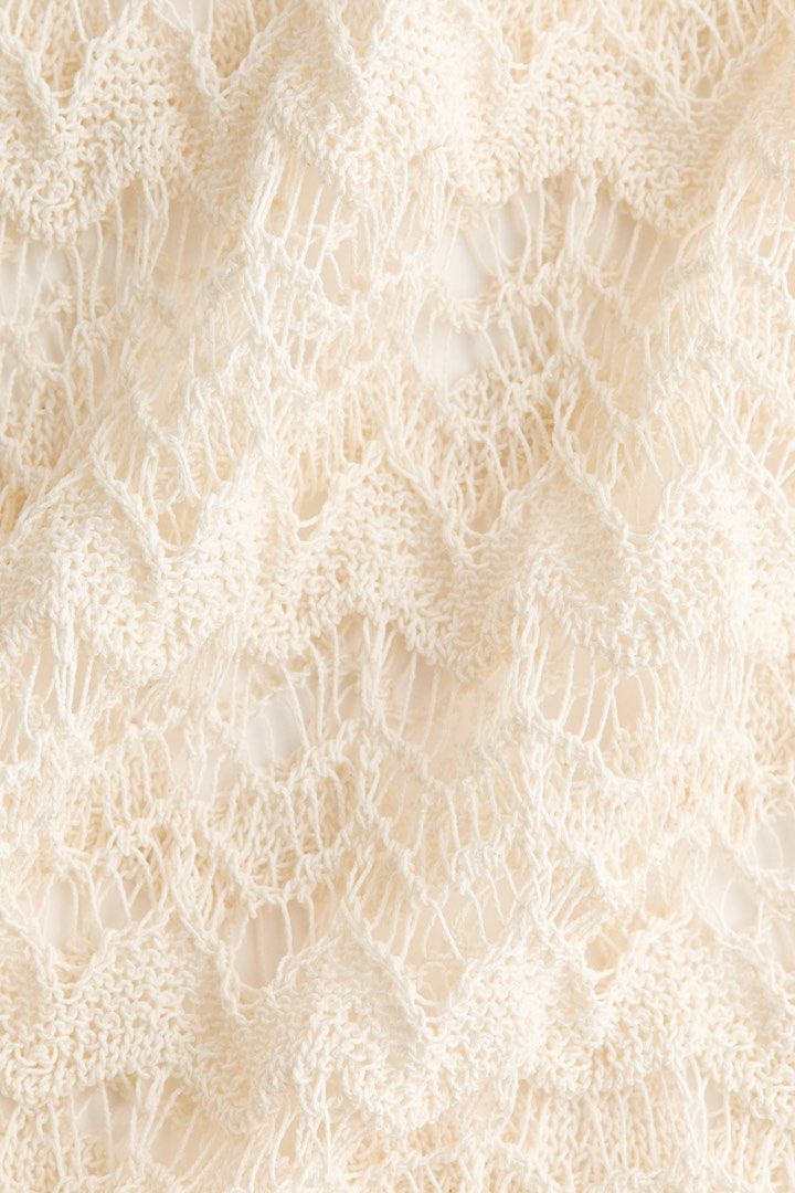Beach cover up (Category: Dresses) located in Manila. Submitted by paperthread (Listing ID 1447264784, Image 3). Description: NO WHEN WORN ON AN ACTUAL MODEL. Please refer to the model instead. Best worn on 5’5 and above - Cream crochet cover-up - V-neck, sleeveless design - Sheer knit with chevron pattern - Ideal for swimwear or as a tunic - Lightweight and airy - Perfect for beach days and poolside lounging - Easy to pack and style.