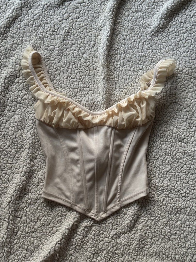 Beige Triangle Top (Category: Blouses) located in San Fernando. Submitted by declutterdolly (Listing ID 1447209048, Image 1). Description: Size: XS-M Closet clean-out, hoping these find new homes 📍Pampanga.