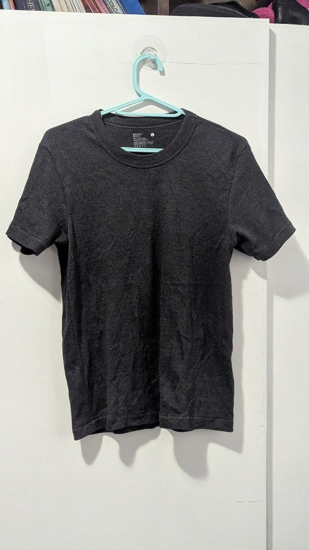 Bench/Body Grey Cotton Polyester T-shirt (Category: Tshirts & Polo Shirts ) located in Marikina City. Submitted by mlektea (Listing ID 1447178647, Image 2). Description: - Brand: Bench/Body - Color: Grey - Size: L on tag pero fits S-M in my opinion - Material: 60% Cotton, 40% Polyester - Style: Basic tee, ideal for everyday wear - Versatility: Easy to pair with any outfit.