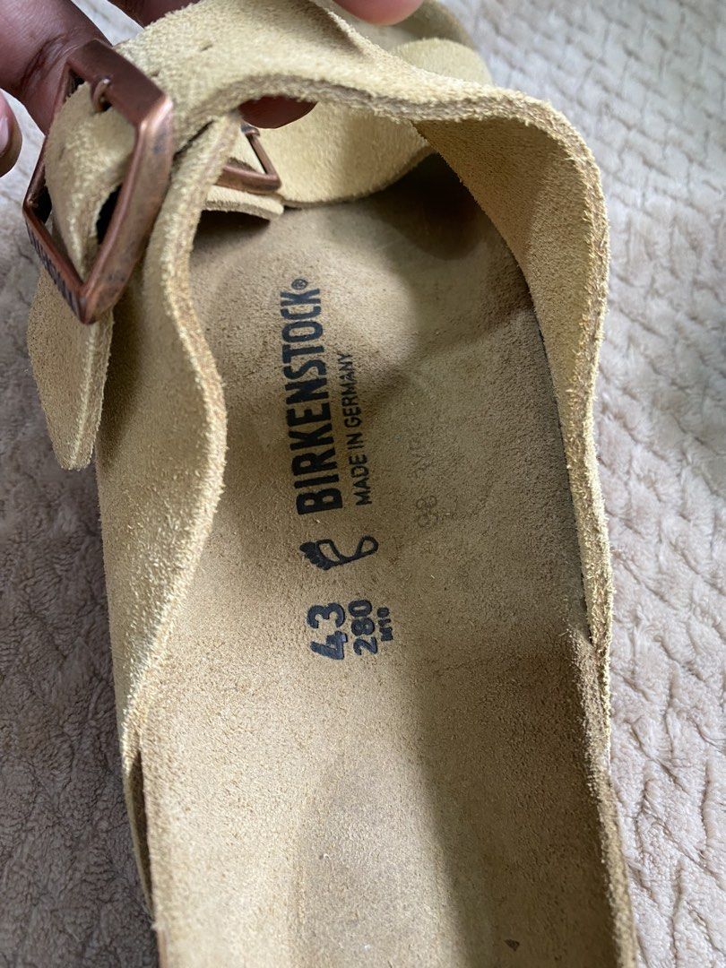 Birkenstock Arizona Suede (Category: Slippers & Slides) located in Pasig City. Submitted by vstn_pr (Listing ID 1447115328, Image 3). Description: - Birkenstock Arizona Sandals - Size: 43 (280mm) - Color: Desert Soil Latte Cream - Made in Germany - Classic double buckle design - Comfortable and supportive cork footbed - Ideal for everyday wear - No Box but brand new and never been used.
