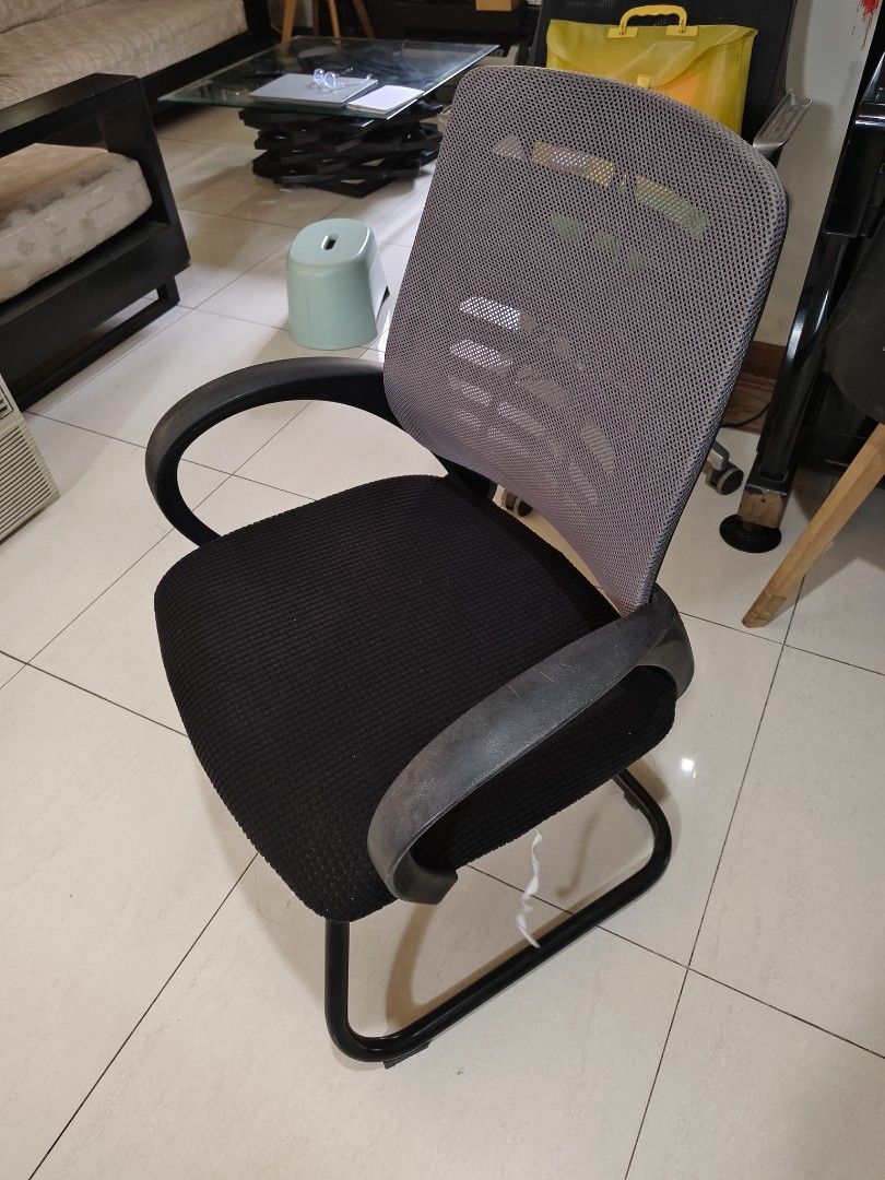 Black Mesh Office Chair with Grey Backrest (Category: Chairs) located in Pasig City. Submitted by maming73 (Listing ID 1447130770, Image 1). Description: - Comfortable black fabric seat - Breathable grey mesh backrest - Sturdy armrests - Stable cantilever base - Ideal for home offices or study areas - Easy to move - Minor signs of wear on armrests.