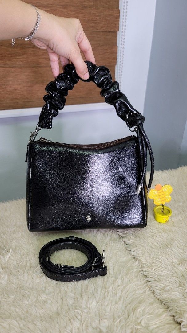 Black Patent Leather Handbag with Ruched Handle (Category: Luxury Bags & Wallets) located in Cavite. Submitted by amairos (Listing ID 1447163260, Image 2). Description: like new small to semi medium twoway no flaws.