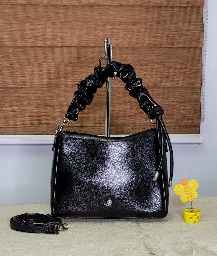 Black Patent Leather Handbag with Ruched Handle (Category: Luxury Bags & Wallets) located in Cavite. Submitted by amairos (Listing ID 1447163260, Image 1). Description: like new small to semi medium twoway no flaws.