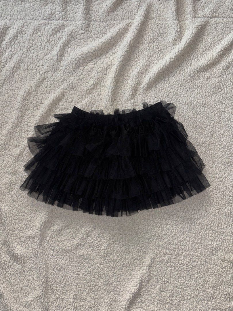 Black Ruffle Skirt (Category: Skirts) located in San Fernando. Submitted by declutterdolly (Listing ID 1447209961, Image 1). Description: Size: XS-M Closet clean-out, hoping these find new homes 📍Pampanga.