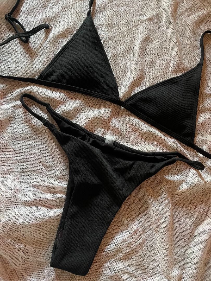 Black Textured Triangle Bikini Set (Category: Bikinis & Swimsuits) located in Batangas. Submitted by mi07d (Listing ID 1447271485, Image 3). Description: - Black textured bikini set - Triangle top with adjustable straps - Thong bottoms - Comfortable and stylish - Ideal for beach or pool days - Perfect for your next vacation.