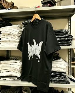 Black T-shirt with 3 White Chickens Graphic Print (Category: Tshirts & Polo Shirts) located in Gelang Patah. Submitted by meiling_penang (Listing ID 1447107306, Image 2). Description: - Cool black t-shirt - Features a funny graphic of three white chickens - Unique and eye-catching design - Short sleeves and crew neck - Comfortable, relaxed fit - Perfect for casual wear - Ideal for those who love quirky animal prints.