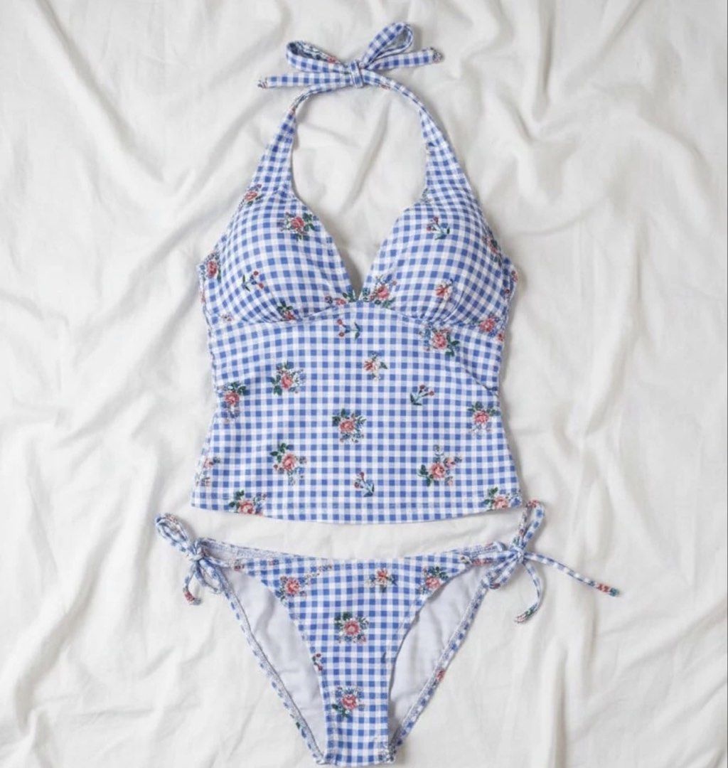 Blue Gingham Floral Halter Bikini Set (Category: Bikinis & Swimsuits) located in Manila. Submitted by shaeshops (Listing ID 1447262893, Image 2). Description: - Adorable blue gingham bikini with a charming floral print. - Features a flattering halter neck top with adjustable tie closure. - Matching bottoms with convenient tie sides for a customizable fit..