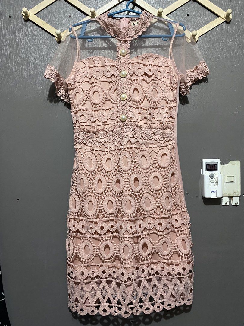 Blush Pink Lace Dress (Category: Dresses) located in Rizal. Submitted by stphndllr (Listing ID 1447184547, Image 1). Description: Blush pink lace dress featuring intricate crochet lace details, mesh sleeves, pearl-style button accents, and a flattering fitted silhouette. 📌Condition: Like New. Only used once. 📌Size: Fits Small to Medium 📌 Color may vary slightly due to lighting. 📌 Please manage expectations as this is a pre-loved item..